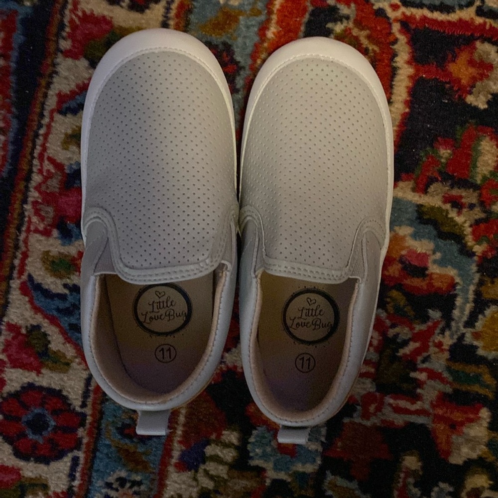 Excellent condition, never worn, size 11 gray slip on